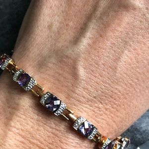 Never worn, diamond chips on side. Stone uncertain. Beautiful